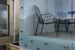 New terrace; glass with stainless steel buttons